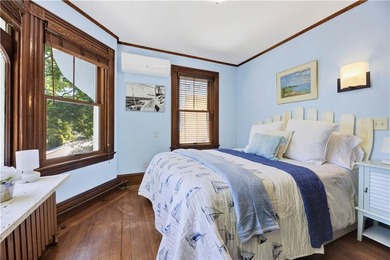 Finest turnkey living. This classic Victorian cottage, painted a - photo 18
