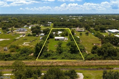 Nestled on over 2.5 private acres in Fort Myers, this spacious - photo 46