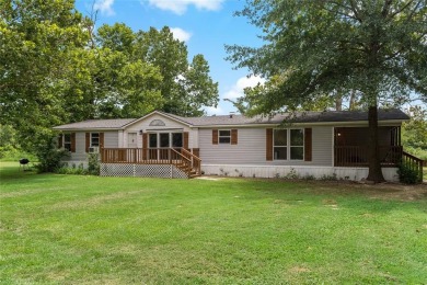 Lake Home For Sale in Powderly, Texas