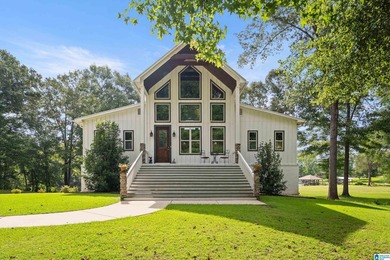Beautiful 3-bedroom, 3 1/2 bath lakefront home that truly has it - photo 2
