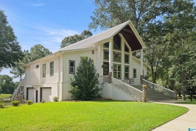 Beautiful 3-bedroom, 3 1/2 bath lakefront home that truly has it - photo 4