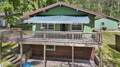 Enjoy beautiful views of Stoneledge Lake from the spacious back - photo 34