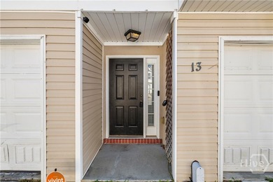 Welcome to 13 Orchid Lane, a charming 3-bedroom, 2-bath end-unit - photo 2
