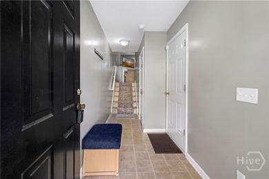 Welcome to 13 Orchid Lane, a charming 3-bedroom, 2-bath end-unit - photo 3