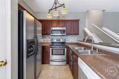 Welcome to 13 Orchid Lane, a charming 3-bedroom, 2-bath end-unit - photo 5