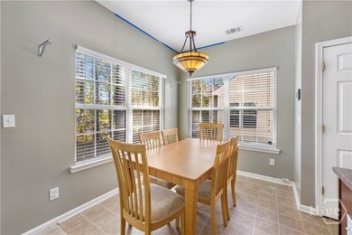 Welcome to 13 Orchid Lane, a charming 3-bedroom, 2-bath end-unit - photo 8