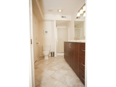 Welcome to this updated two-bedroom, two-bath condominium - photo 7