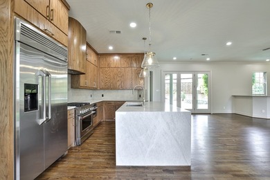 Fully remodeled in 2026, this exceptional home is located in the - photo 12