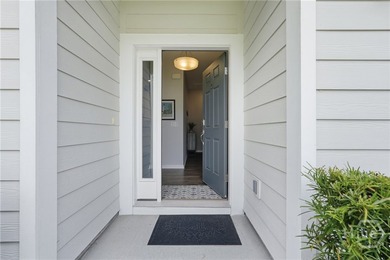 End unit townhome with custom closets and extended paver patio - photo 3