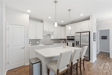 End unit townhome with custom closets and extended paver patio - photo 5