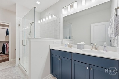 End unit townhome with custom closets and extended paver patio - photo 9