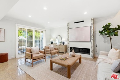 Stunningly renovated townhome overlooking a beautifully - photo 1