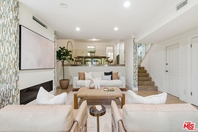 Stunningly renovated townhome overlooking a beautifully - photo 3
