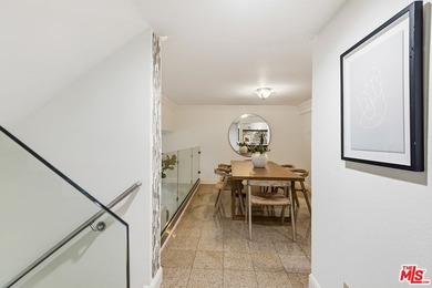 Stunningly renovated townhome overlooking a beautifully - photo 9