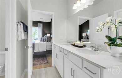 The Guilford offers 4 bedrooms, 2.5 baths, and a thoughtfully - photo 9