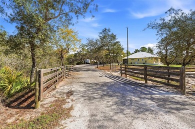 A True Escape Into Old Florida. Tucked deep within the (gated - photo 2