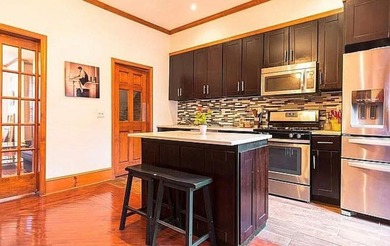 Located in the heart of Bedford-Stuyvesant, this solid brick - photo 11