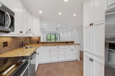 UPDATED UPPER CORNER 2 BED, 2BTH CONDO W/LAKEVIEWS. FRESHLY - photo 12