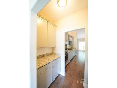Welcome to the gated Woodlands Villas at Southbridge, where this - photo 6