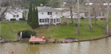 Live on the water in this 3 BR, 2 bath ranch home with walk-out S - Lake Home SOLD! in Willard, Ohio
