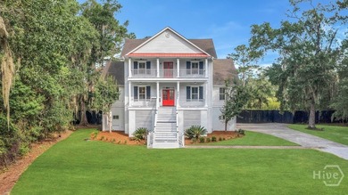 Situated on over an acre of beautifully landscaped marshfront - photo 2