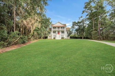 Situated on over an acre of beautifully landscaped marshfront - photo 6