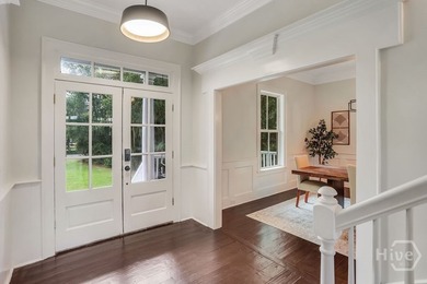 Situated on over an acre of beautifully landscaped marshfront - photo 9