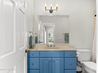 Welcome to this exquisite custom-built soundfront home in