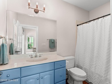 Welcome to this exquisite custom-built soundfront home in