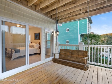 Welcome to this exquisite custom-built soundfront home in