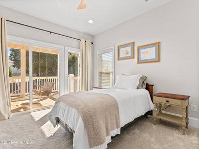 Welcome to this exquisite custom-built soundfront home in