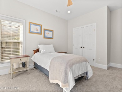 Welcome to this exquisite custom-built soundfront home in