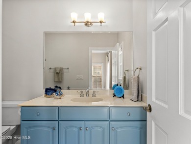 Welcome to this exquisite custom-built soundfront home in