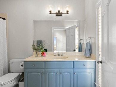 Welcome to this exquisite custom-built soundfront home in