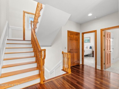 Welcome to this exquisite custom-built soundfront home in