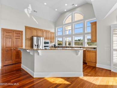 Welcome to this exquisite custom-built soundfront home in
