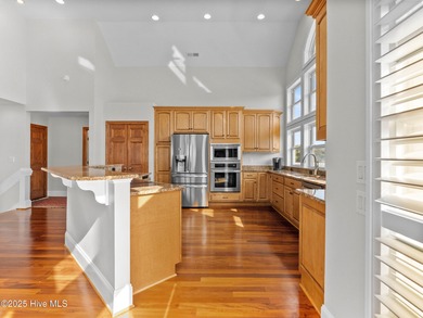 Welcome to this exquisite custom-built soundfront home in