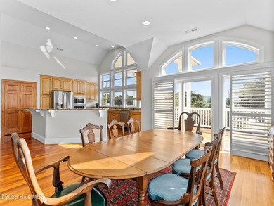 Welcome to this exquisite custom-built soundfront home in