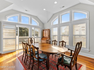 Welcome to this exquisite custom-built soundfront home in