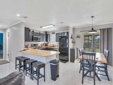 Welcome to your dream home in the heart of Port St. Lucie! This - photo 3