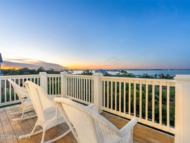 Welcome to this exquisite custom-built soundfront home in