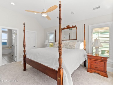 Welcome to this exquisite custom-built soundfront home in