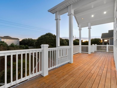 Welcome to this exquisite custom-built soundfront home in