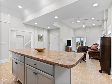 Welcome to this exquisite custom-built soundfront home in