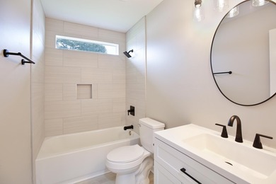 NO HOA + TOTAL 2025 REMODEL! 6 MILES FROM THE BEACH! Experience