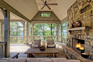 Perched high above the shimmering waters of Lake Burton within - photo 3