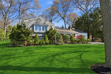 Desirable East Moriches location! This 3-bedroom, 2-bath - photo 1