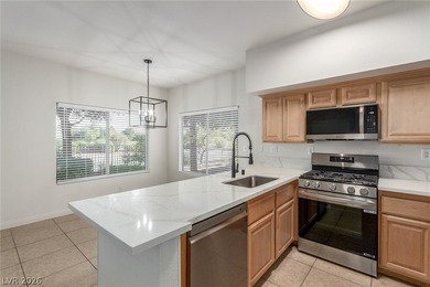 MOVE IN READY, FIRST FLOOR UNIT. Easy access to golf at Painted