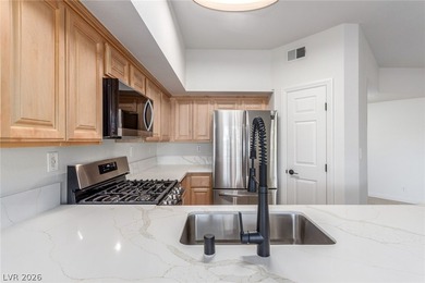 MOVE IN READY, FIRST FLOOR UNIT. Easy access to golf at Painted