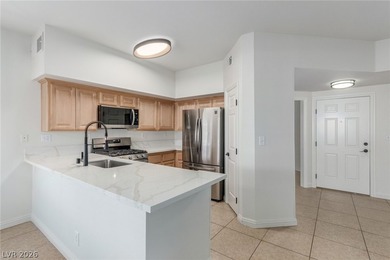 MOVE IN READY, FIRST FLOOR UNIT. Easy access to golf at Painted